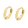 Gold hoop earrings with bead-like design on a white background