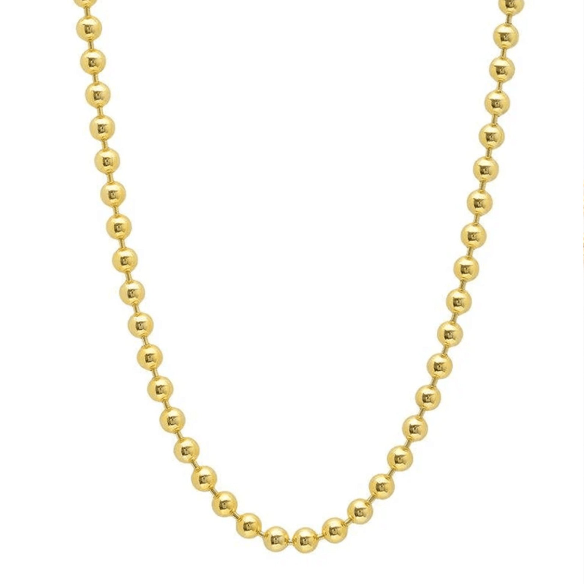 Gold beaded necklace on a white background