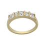 Gold ring with five diamonds on a white background