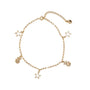 Gold bracelet with star and shell charms on a white background