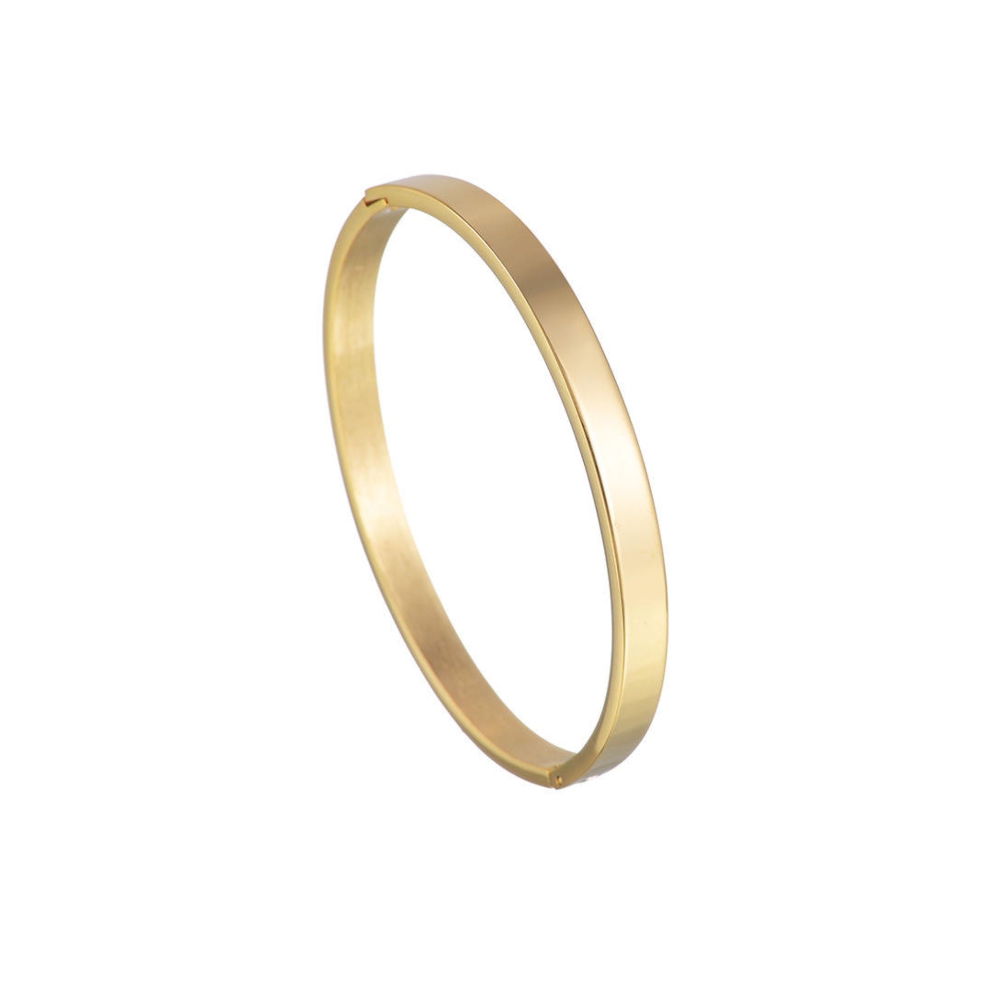 Gold bangle on a white background