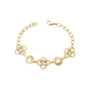 Gold chain bracelet on a white background