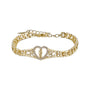 Gold bracelet with a heart design on a white background