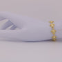 Sea Turtle Link Bracelet on a soft purple fabric background