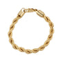 Gold braided bracelet on a white background