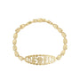 Gold bracelet with leaf-like links on a white background