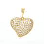 Gold heart-shaped pendant with clear stones on a white background