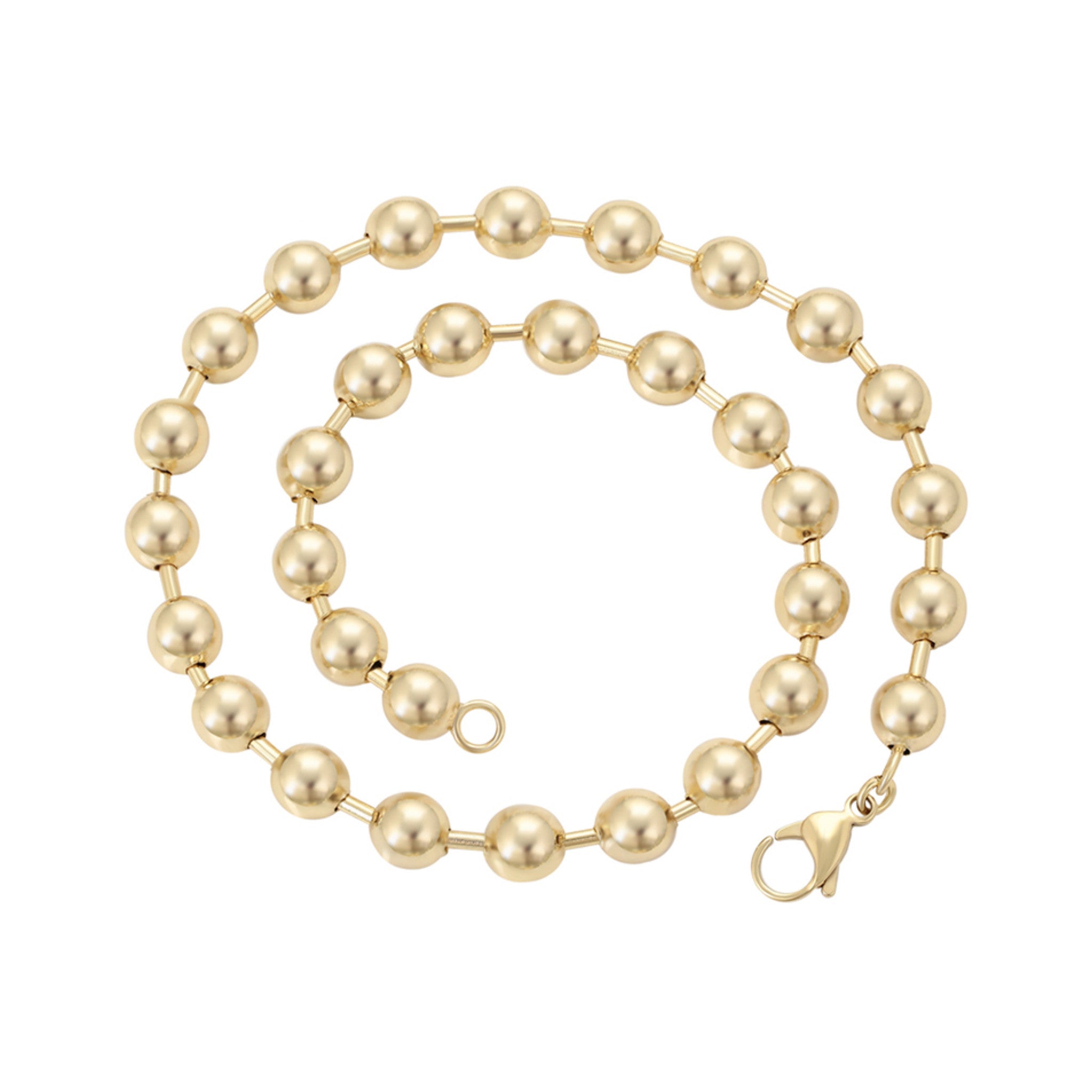 Gold beaded necklace on a white background