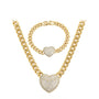 Gold chain necklace and bracelet with heart-shaped pendants on a white background