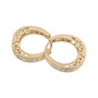Pair of gold hoop earrings on a white background