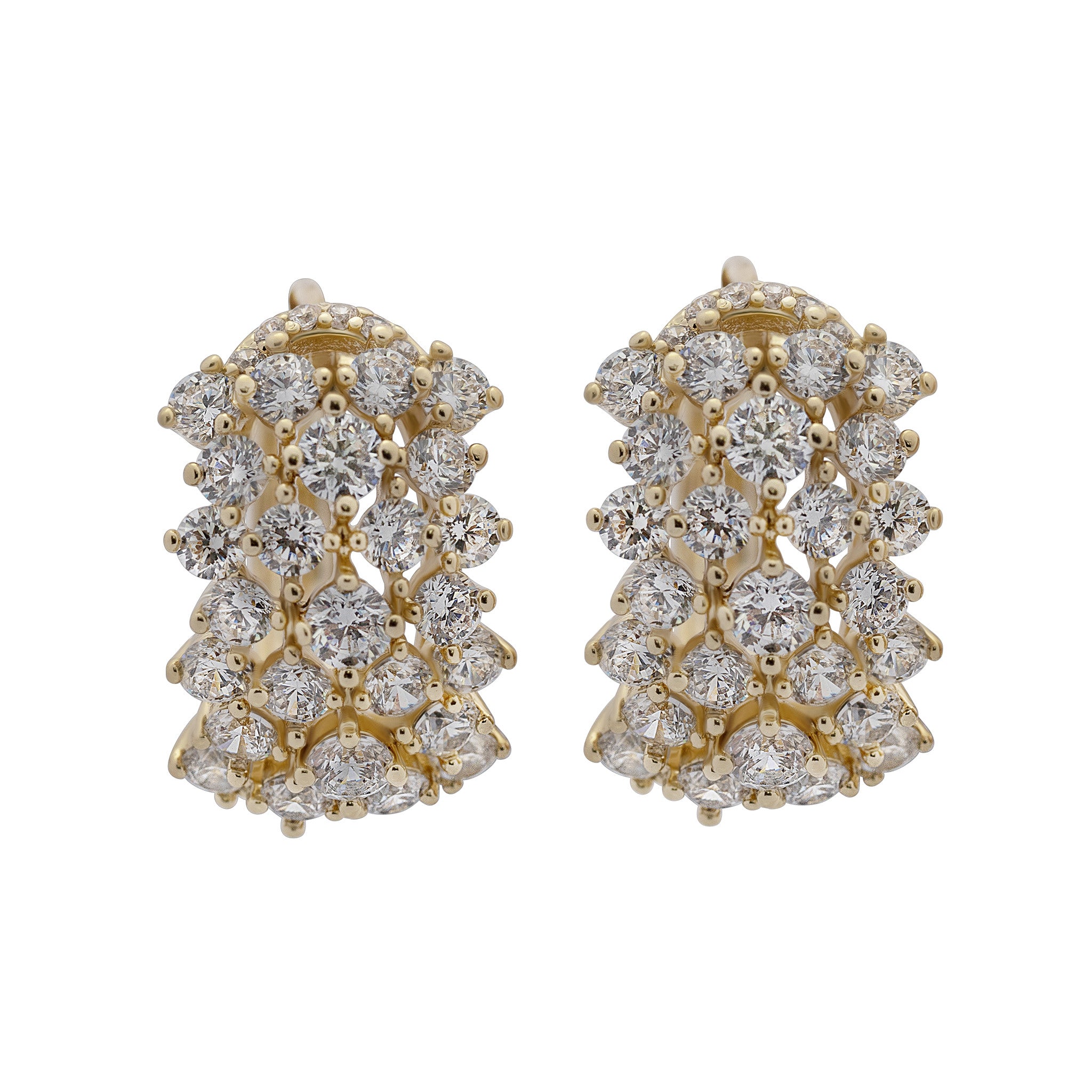 Pair of gold and diamond earrings on a white background