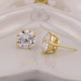 Gold stud earrings with clear gemstones on a white background