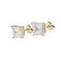 Gold earrings with clear gemstones on a white background