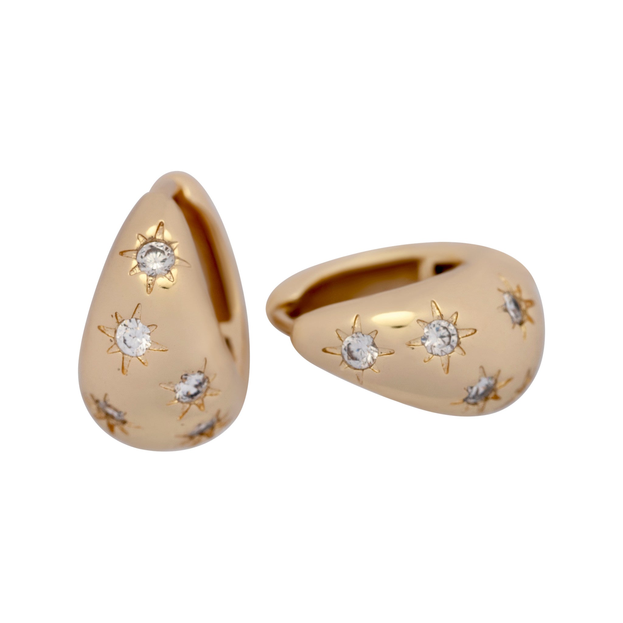 Gold earrings with star and gemstone designs on a white background
