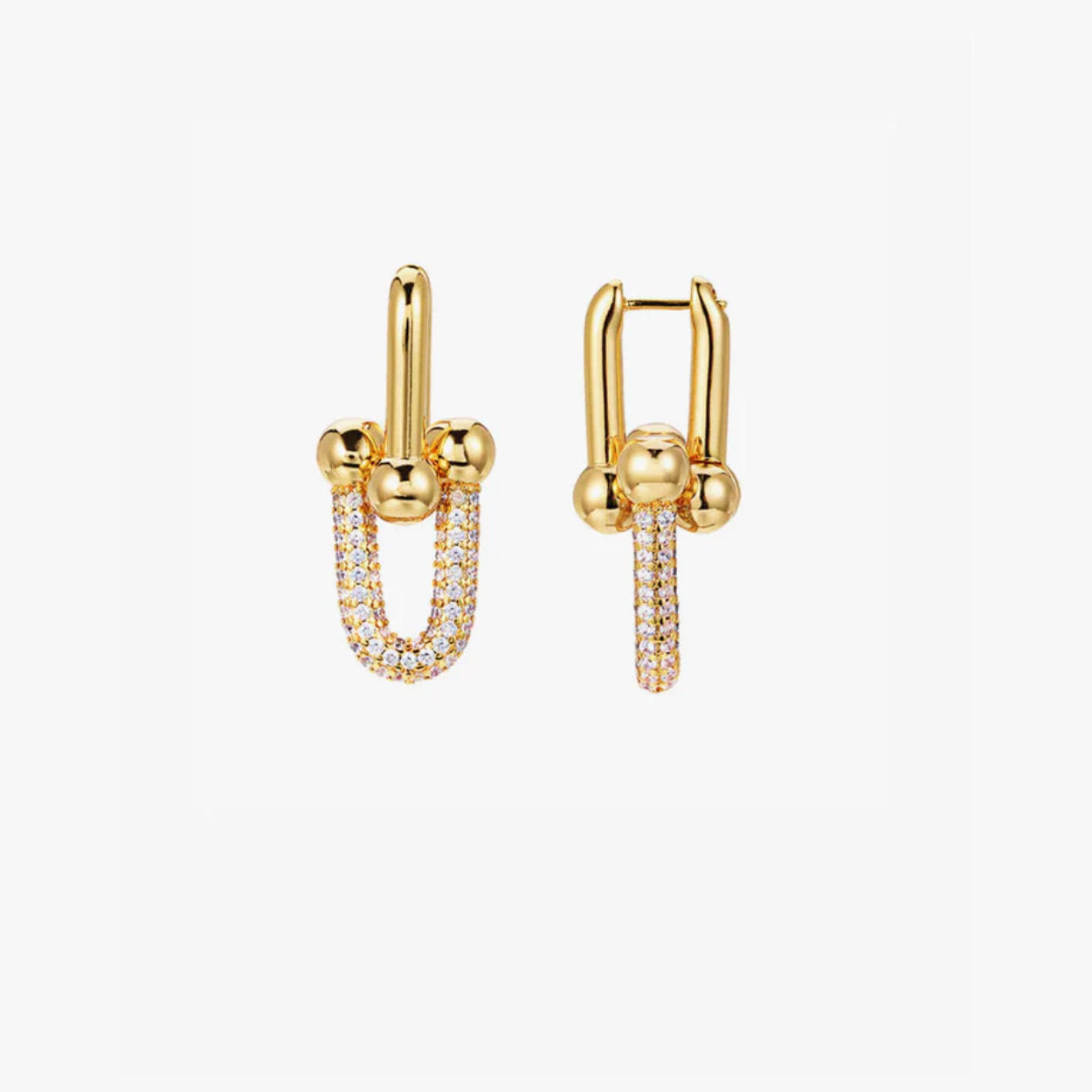 Gold hoop earrings with small diamonds on a white background