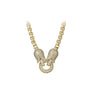 Gold necklace with a intricate pendant on a white background