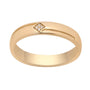 Gold ring with a diamond on a white background