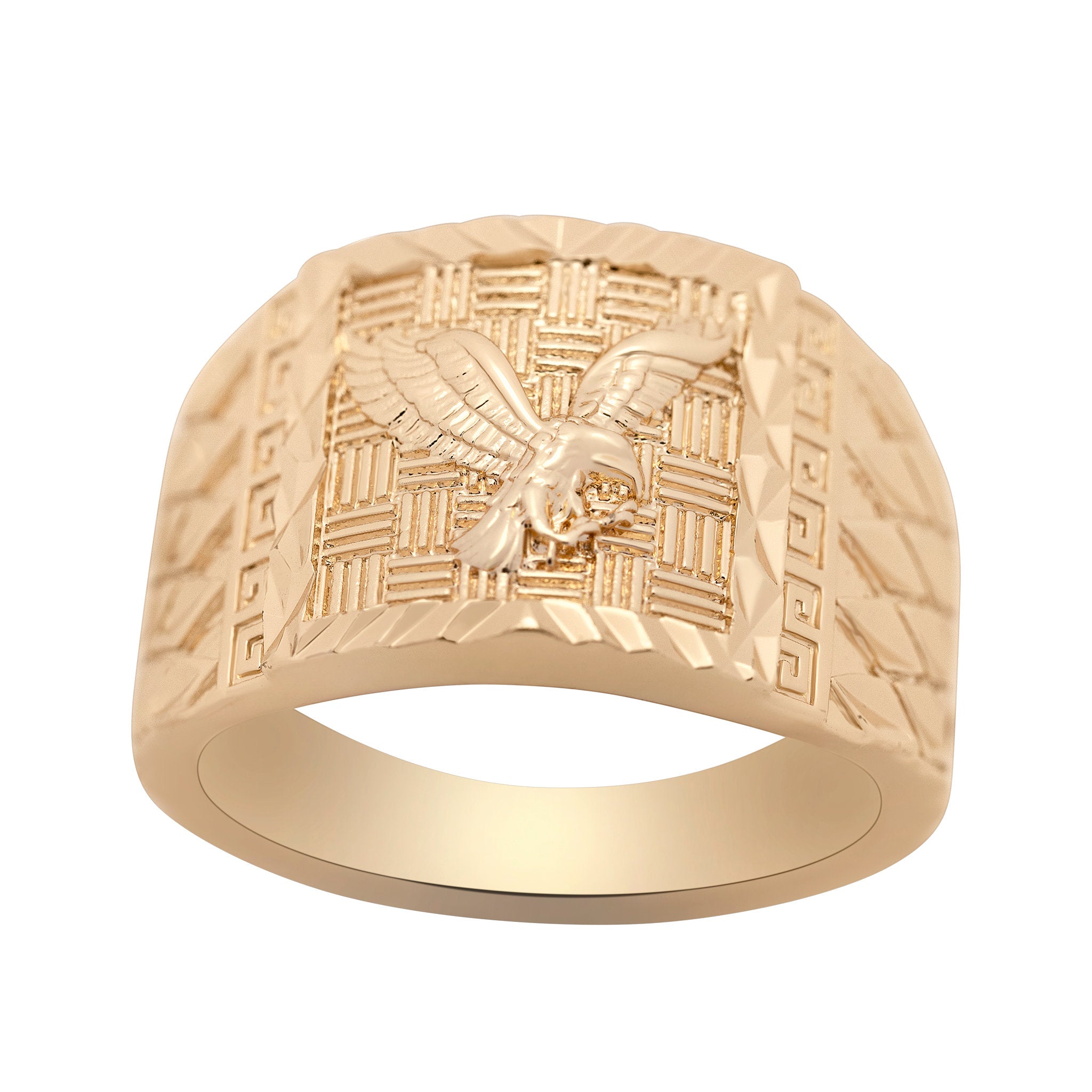 Gold ring with eagle emblem on a white background