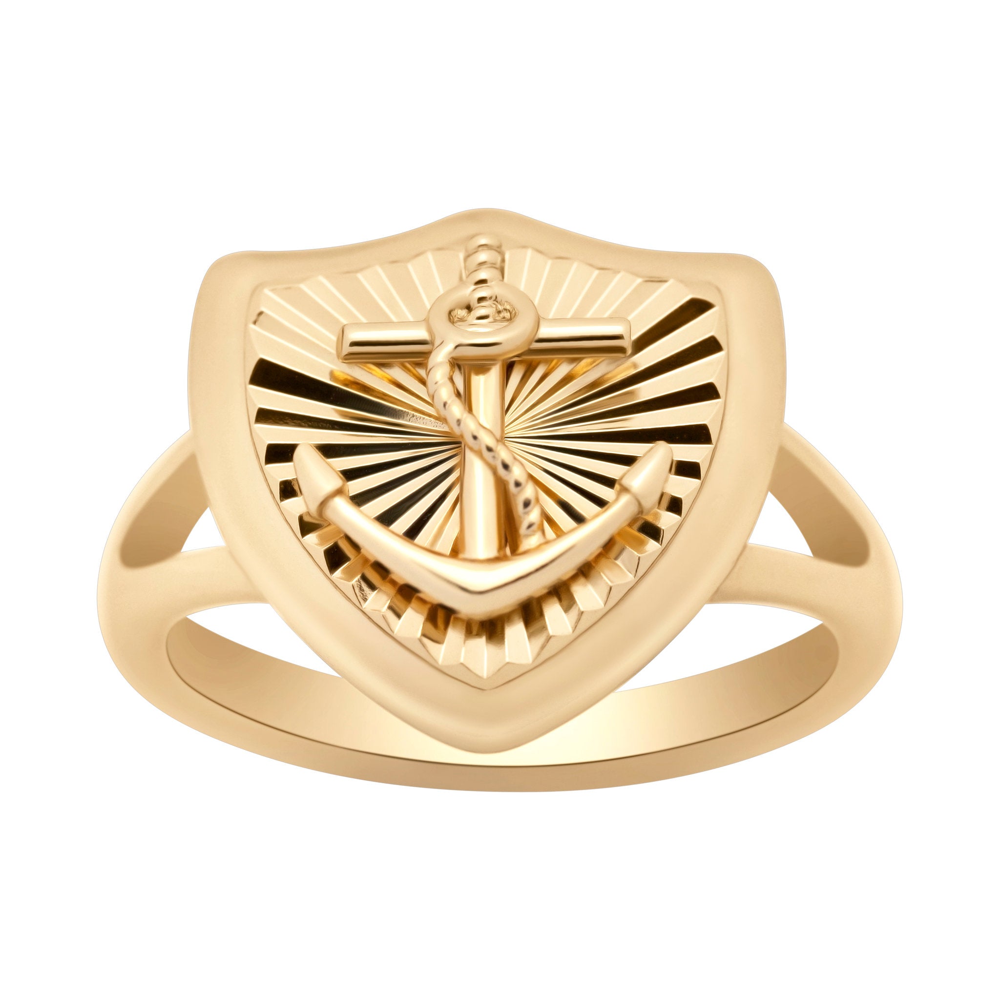 Gold ring with a shield design and central emblem on a white background