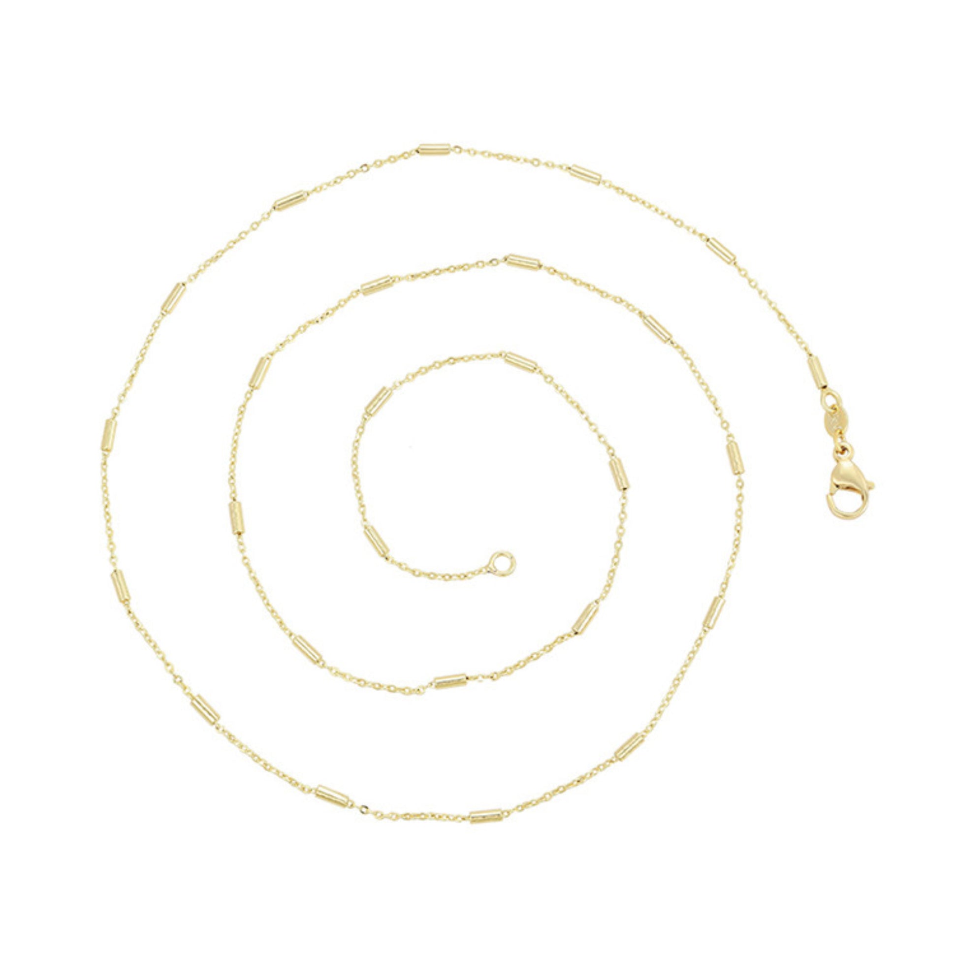 Gold chain necklace on a white background