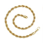 Gold rope chain necklace on a white background