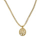 Gold necklace with a tree-of-life pendant on a white background