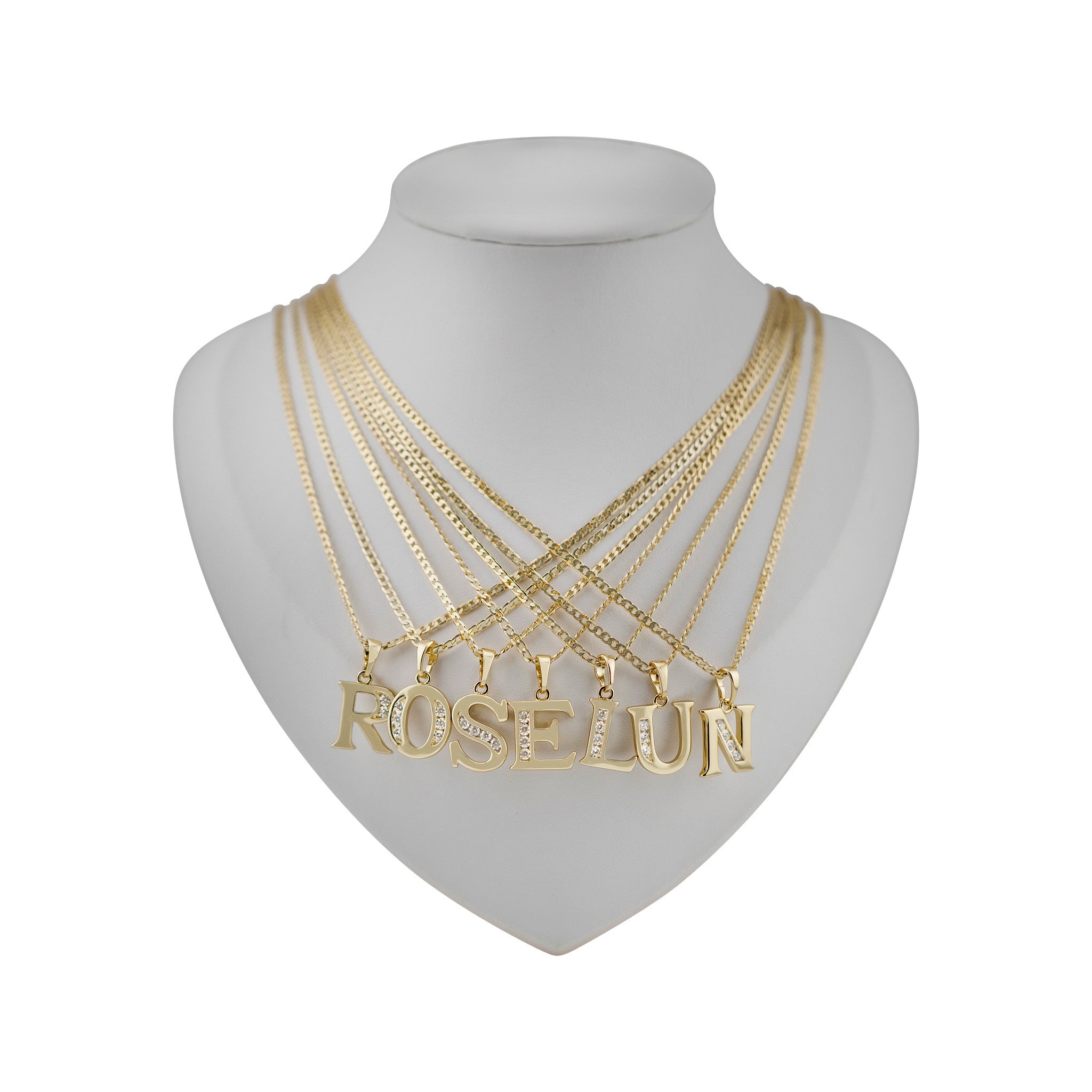 Gold necklaces with 'ROSELUN' pendant on a mannequin