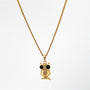 Gold owl pendant necklace on a white background