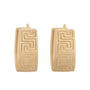 Pair of gold hoop earrings with a geometric pattern on a white background