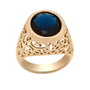 Gold ring with a blue gemstone on a white background