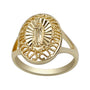 Gold ring with intricate design on a white background