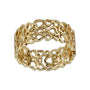 Gold bracelet with intricate heart designs on a white background