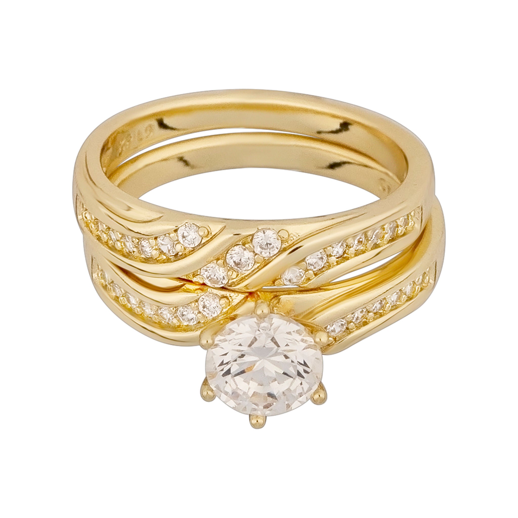 Gold ring with diamond accents on a white background