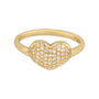 Gold heart-shaped ring with embedded diamonds on a white background