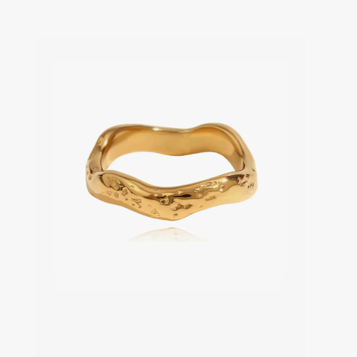 Gold ring with a textured design on a white background